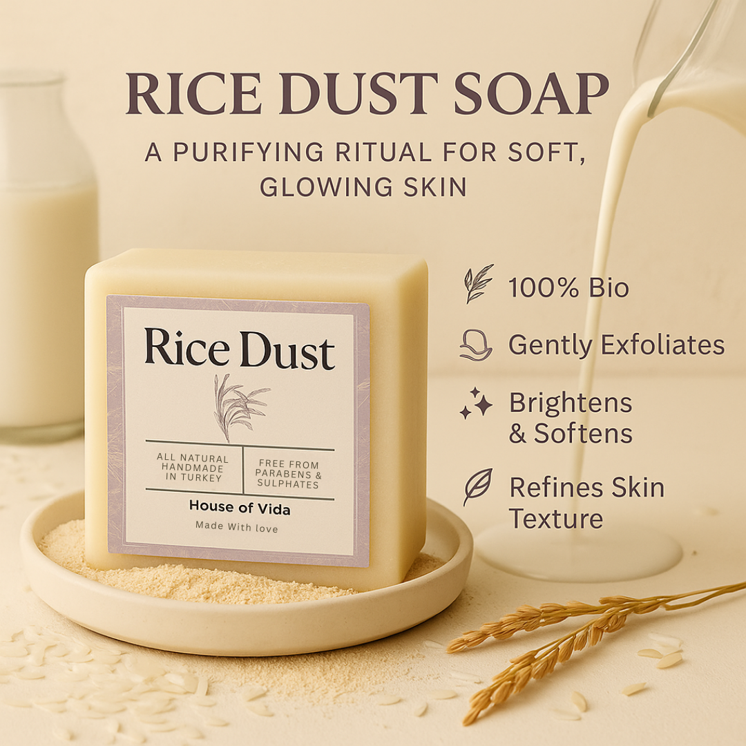 Rice Dust soap bar with packaging on a beige background, featuring text about its benefits.